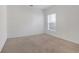 Simple bedroom with neutral wall and carpet at 3838 Gulf Shore Cir, Kissimmee, FL 34746