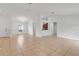 Open concept dining area with tile floors and kitchen access at 3838 Gulf Shore Cir, Kissimmee, FL 34746