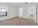 Bedroom with window, closet, and carpet at 3838 Gulf Shore Cir, Kissimmee, FL 34746
