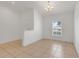 Bright living room with tile floors and a window at 3838 Gulf Shore Cir, Kissimmee, FL 34746