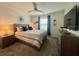 Spacious bedroom with a queen bed, nightstands and large TV at 4295 Paragraph Dr, Kissimmee, FL 34746
