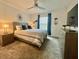 Main bedroom with a dresser and a double bed at 4295 Paragraph Dr, Kissimmee, FL 34746
