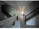 Bright entryway with staircase and mirror at 4295 Paragraph Dr, Kissimmee, FL 34746