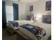 Twins bedroom with Captain's beds, nightstands, and Marvel-themed bedding at 4295 Paragraph Dr, Kissimmee, FL 34746