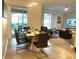 Modern dining room with table and chairs at 4295 Paragraph Dr, Kissimmee, FL 34746