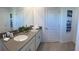 Modern bathroom with double vanity and updated fixtures at 4295 Paragraph Dr, Kissimmee, FL 34746