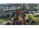 Aerial view of property near lake and neighborhood at 4321 Rummell Rd, St Cloud, FL 34769