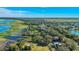 Property with expansive waterfront views and lush landscape at 4321 Rummell Rd, St Cloud, FL 34769
