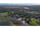 Wide aerial view of property and surrounding area at 4321 Rummell Rd, St Cloud, FL 34769