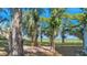 Relaxing patio seating area overlooking a tranquil lake at 4321 Rummell Rd, St Cloud, FL 34769
