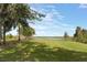Scenic lakefront property with lush green grass at 4321 Rummell Rd, St Cloud, FL 34769