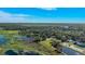Aerial view of waterfront property with lush green landscape and calm waters at 4321 Rummell Rd, St Cloud, FL 34769