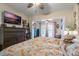 Main bedroom with large dresser and access to backyard at 4321 Rummell Rd, St Cloud, FL 34769