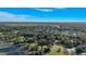 Aerial view showing a home situated on a tranquil lakefront community at 4321 Rummell Rd, St Cloud, FL 34769