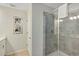 Bathroom with a large walk-in shower and double vanity at 4751 Clock Tower Dr # 107, Kissimmee, FL 34746