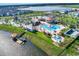 Aerial view of community with large pool and water features at 4751 Clock Tower Dr # 107, Kissimmee, FL 34746