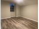 Spacious bedroom with large window and neutral walls at 523 Royal Ridge Dr, Davenport, FL 33837