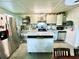Updated kitchen with stainless steel appliances and island at 5312 Goddard Ave, Orlando, FL 32810