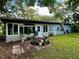 Back of house with a patio and potted plants at 5312 Goddard Ave, Orlando, FL 32810