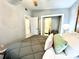 Bedroom with a queen bed and en-suite bathroom access at 5312 Goddard Ave, Orlando, FL 32810