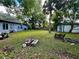 Large backyard with shed and a wooden pallet at 5312 Goddard Ave, Orlando, FL 32810