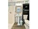 Clean bathroom with pedestal sink, toilet, shower, and storage at 5312 Goddard Ave, Orlando, FL 32810