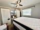 Cozy bedroom with a queen bed, closet, and window at 5312 Goddard Ave, Orlando, FL 32810