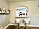 Kitchen nook with two white barstools and a view of the kitchen at 5312 Goddard Ave, Orlando, FL 32810