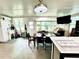 Bright dining area with a table and access to backyard at 5312 Goddard Ave, Orlando, FL 32810