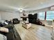 Living room features a fireplace and plenty of seating at 5312 Goddard Ave, Orlando, FL 32810