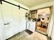 Updated kitchen with coffee bar and barn door at 5312 Goddard Ave, Orlando, FL 32810