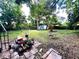 Spacious backyard with shed and various plants at 5312 Goddard Ave, Orlando, FL 32810