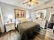 Cozy bedroom with a queen-size bed and ample closet space at 5312 Goddard Ave, Orlando, FL 32810