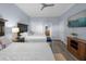 Guest bedroom with two beds and a view of the balcony at 7662 Whisper Way # 402, Reunion, FL 34747
