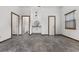 Main bedroom with en-suite bathroom and grey tile floors at 965 Keen Rd, Frostproof, FL 33843
