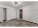 Bedroom with tile floors and double doors leading to a closet at 965 Keen Rd, Frostproof, FL 33843