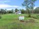 Large backyard with a home and shed, offering ample space at 965 Keen Rd, Frostproof, FL 33843
