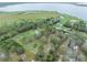 Aerial view showcasing property's waterfront location and expansive lot at 965 Keen Rd, Frostproof, FL 33843