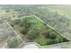 House on a large lot with mature trees and open fields at 965 Keen Rd, Frostproof, FL 33843