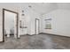 Bedroom with en-suite bathroom and grey tile floors at 965 Keen Rd, Frostproof, FL 33843
