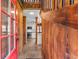 Entryway with wooden walls and a view of the kitchen at 965 Keen Rd, Frostproof, FL 33843