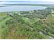 Aerial view of property with lake and rural surroundings at 965 Keen Rd, Frostproof, FL 33843