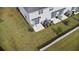 Private backyard with patio, grassy area, and fence at 3550 Davenport Creek Ct, Kissimmee, FL 34746