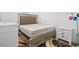 Bedroom with a queen-size bed, nightstand and decorative rug at 3550 Davenport Creek Ct, Kissimmee, FL 34746