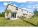 Private backyard with patio and grassy area at 3550 Davenport Creek Ct, Kissimmee, FL 34746
