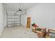 Garage with an automatic door opener and concrete floor at 3550 Davenport Creek Ct, Kissimmee, FL 34746