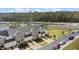 Aerial view of a townhome community with nearby road construction at 3550 Davenport Creek Ct, Kissimmee, FL 34746