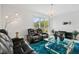 Relaxing living room with leather recliners and a stylish coffee table at 3550 Davenport Creek Ct, Kissimmee, FL 34746