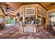 Indoor pool bar with seating and various drinks at 12527 Floridays Resort Dr # E-103, Orlando, FL 32821