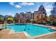 Resort-style pool with a gazebo and surrounding landscaping at 12527 Floridays Resort Dr # E-103, Orlando, FL 32821